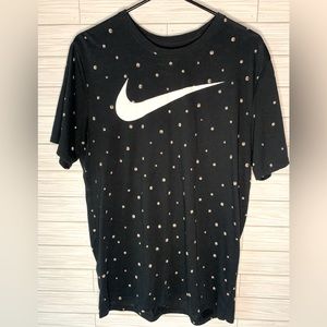 Nike logo with tiny basket balls polka dots all over the shirt